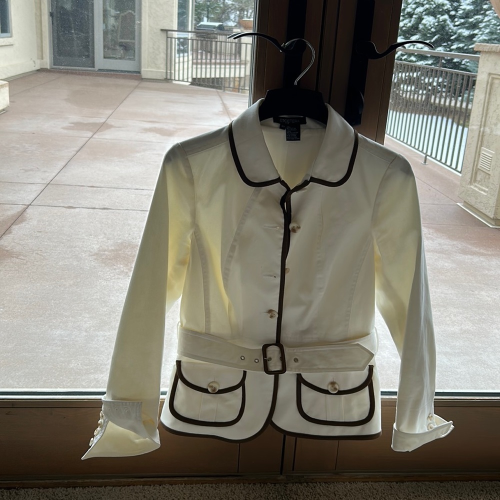 Gorgeous white jacket with brown trim details